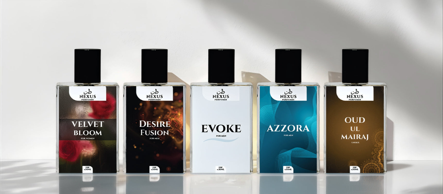 Five Muelis perfume bottles with different colored labels on a reflective surface.